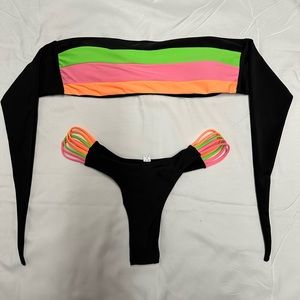 NWOT. Women’s two piece bikini. Size XL. String sides on bottom.